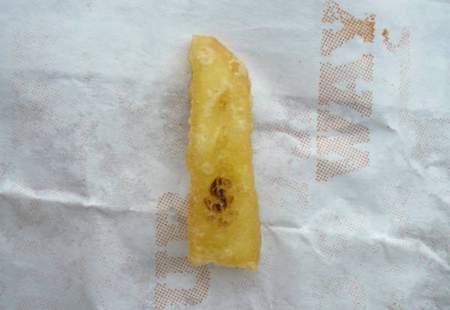 Eine Pommes mit Dollar-Zeichen vom Burger-King...
